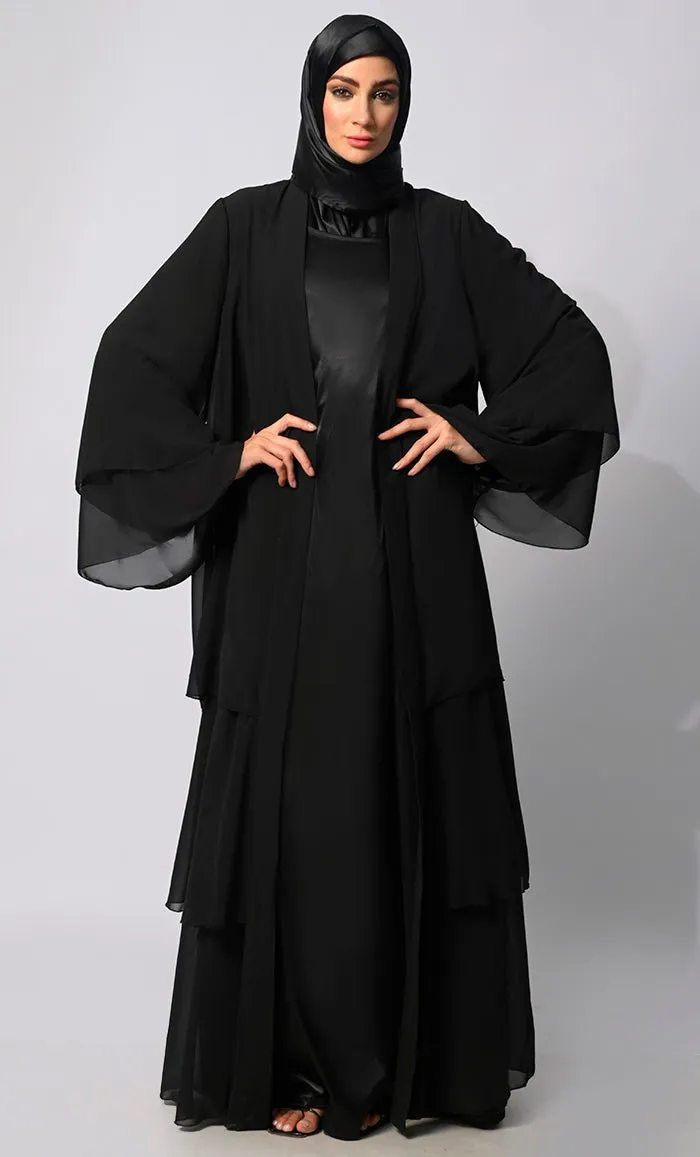 Elegance in Layers: Black Tiered Shrug with Satin Lining