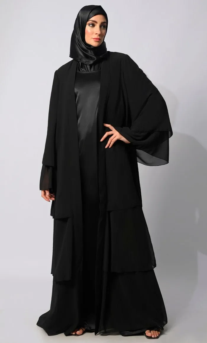 Elegance in Layers: Black Tiered Shrug with Satin Lining