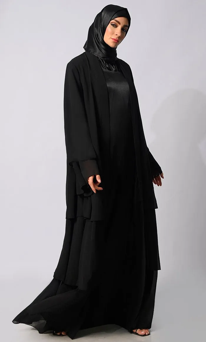 Elegance in Layers: Black Tiered Shrug with Satin Lining